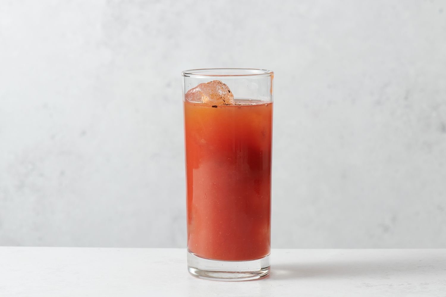 Hot sauce, celery salt, black pepper, and horseradish added to the highball glass