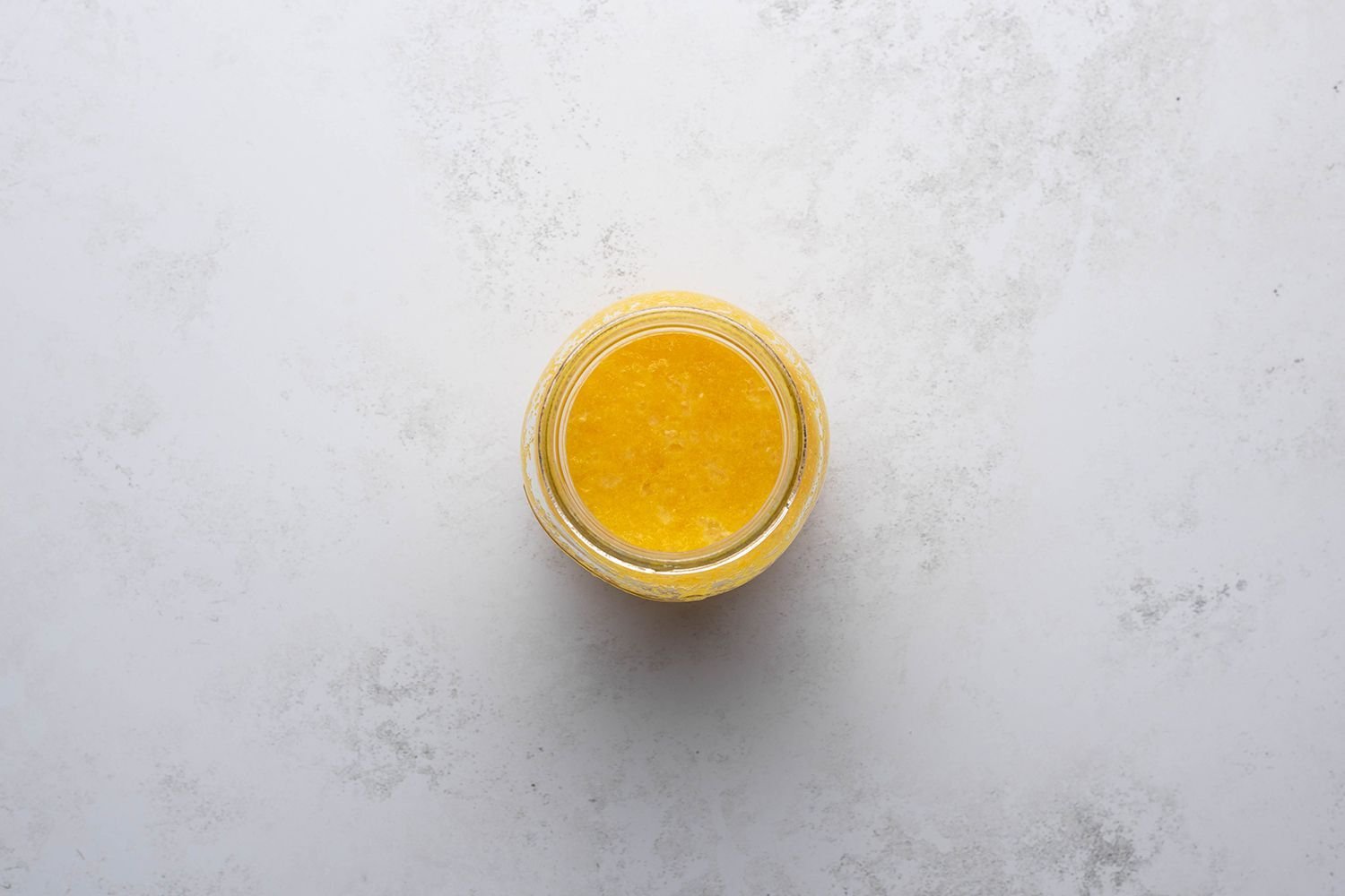 Lemon curd in a glass container