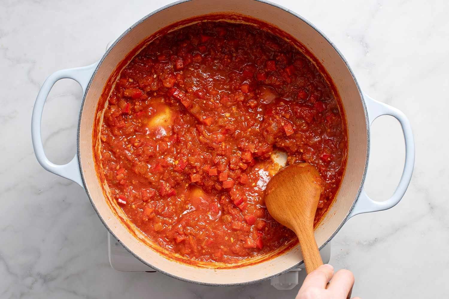 Space created in the tomato sauce in the pot