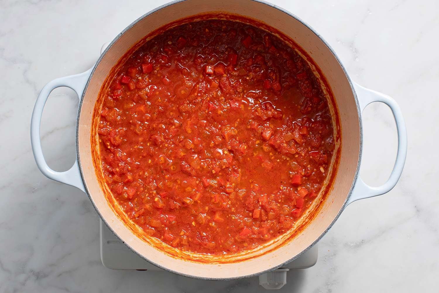 Tomato sauce cooking in a pot