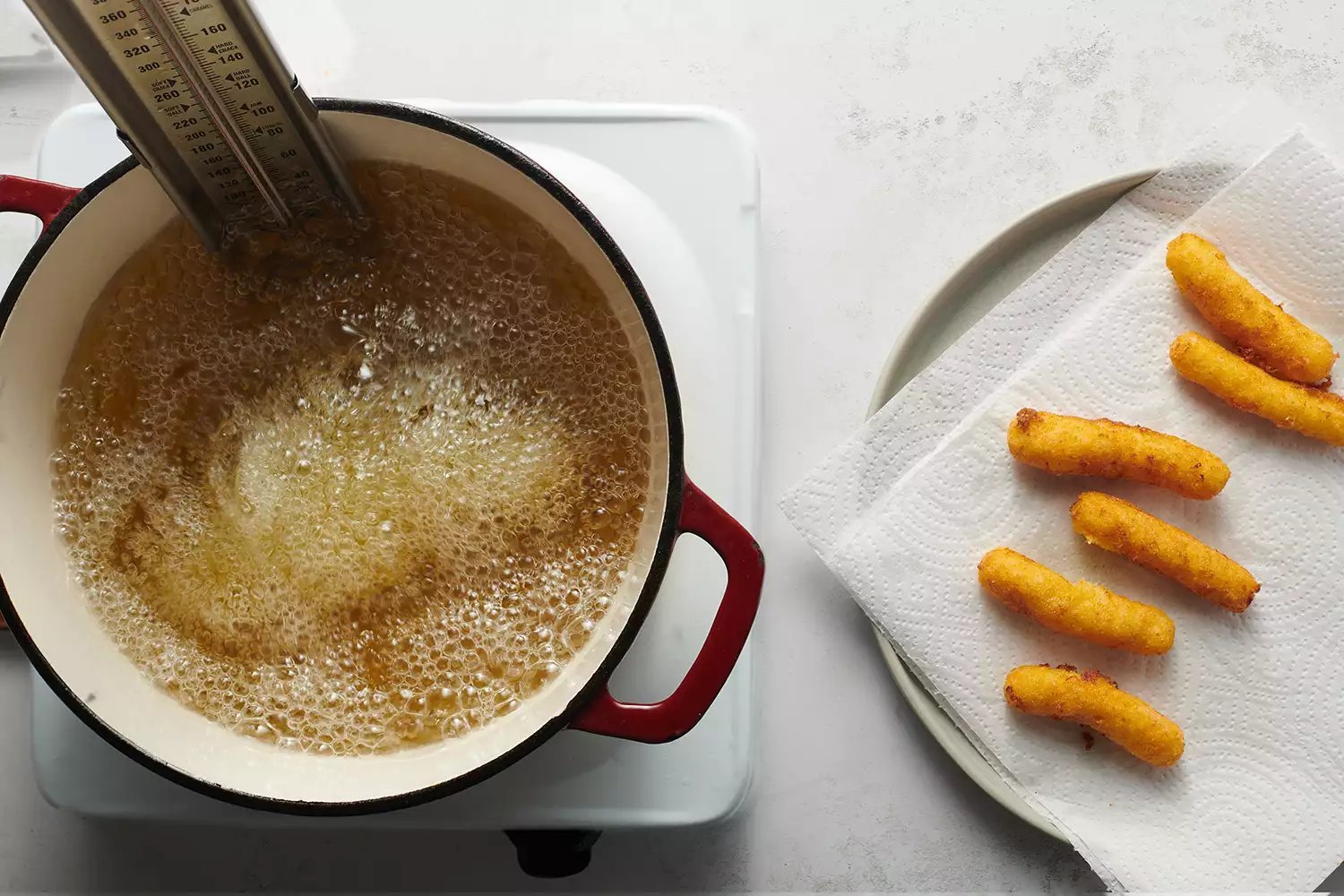 Sorullos de Maíz fritando em óleo