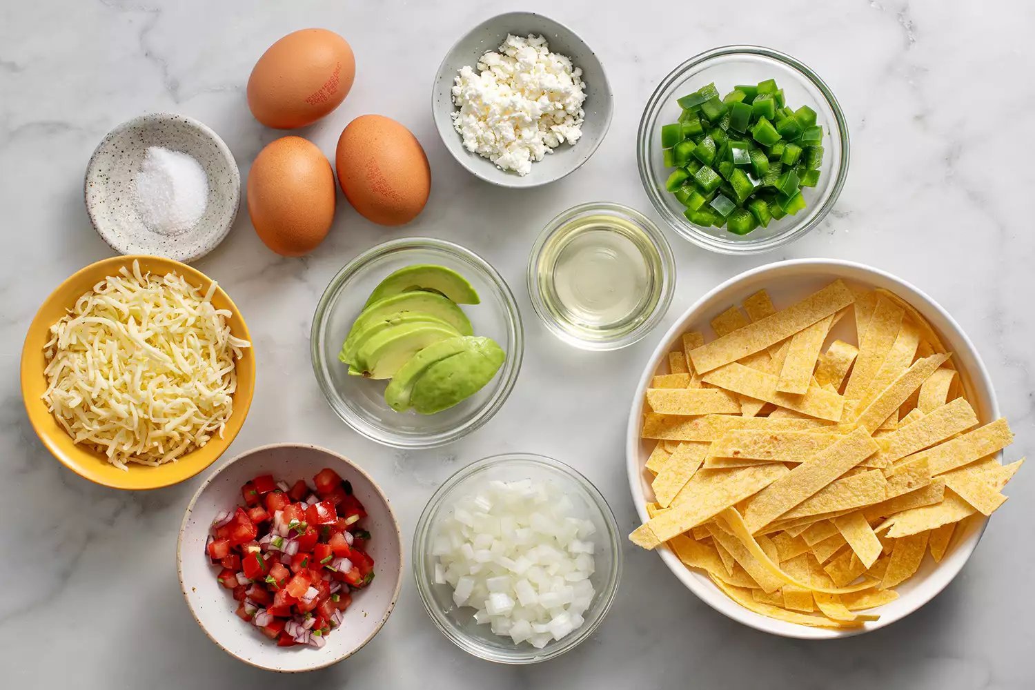 Migas ingredients in bowls
