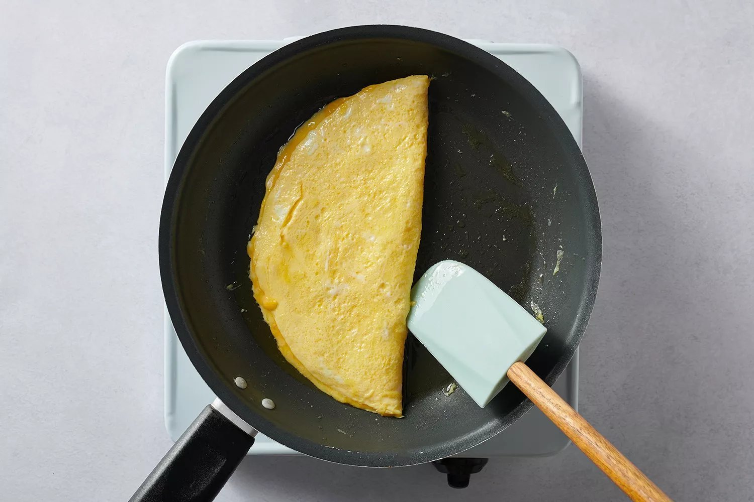 ovos cozinhando na frigideira